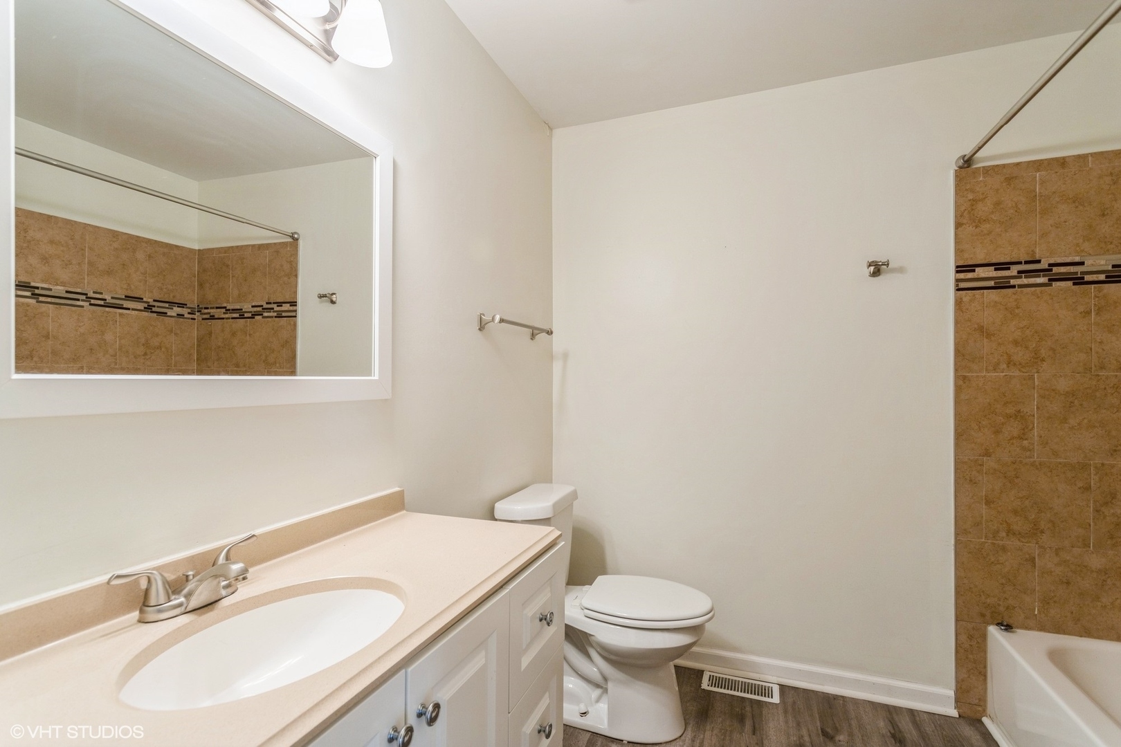 3022 Anton Drive Aurora, IL 60504 - Photo 13 of 15 a bathroom with a sink a toilet and mirror