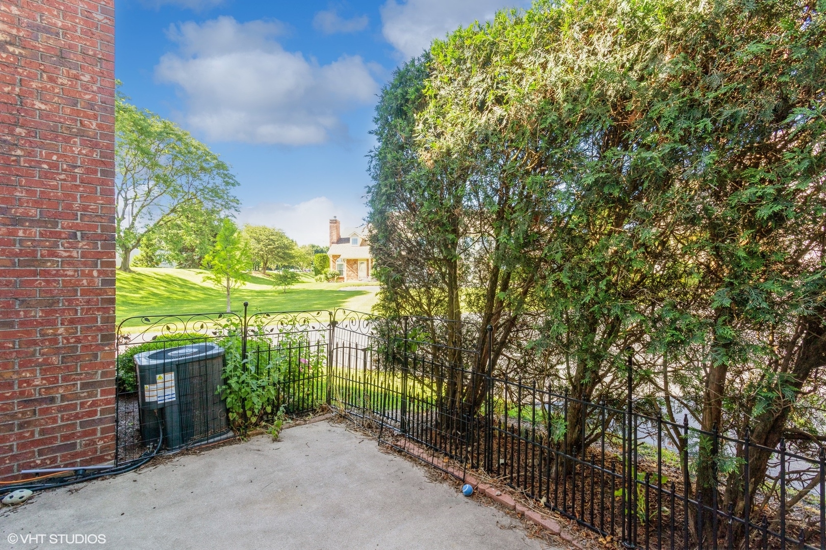 3022 Anton Drive Aurora, IL 60504 - Photo 14 of 15 a backyard of a house with large trees and plants