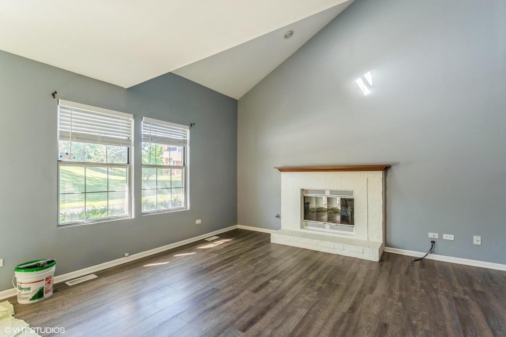 3022 Anton Drive Aurora, IL 60504 - Photo 3 of 15 an empty room with wooden floor and windows