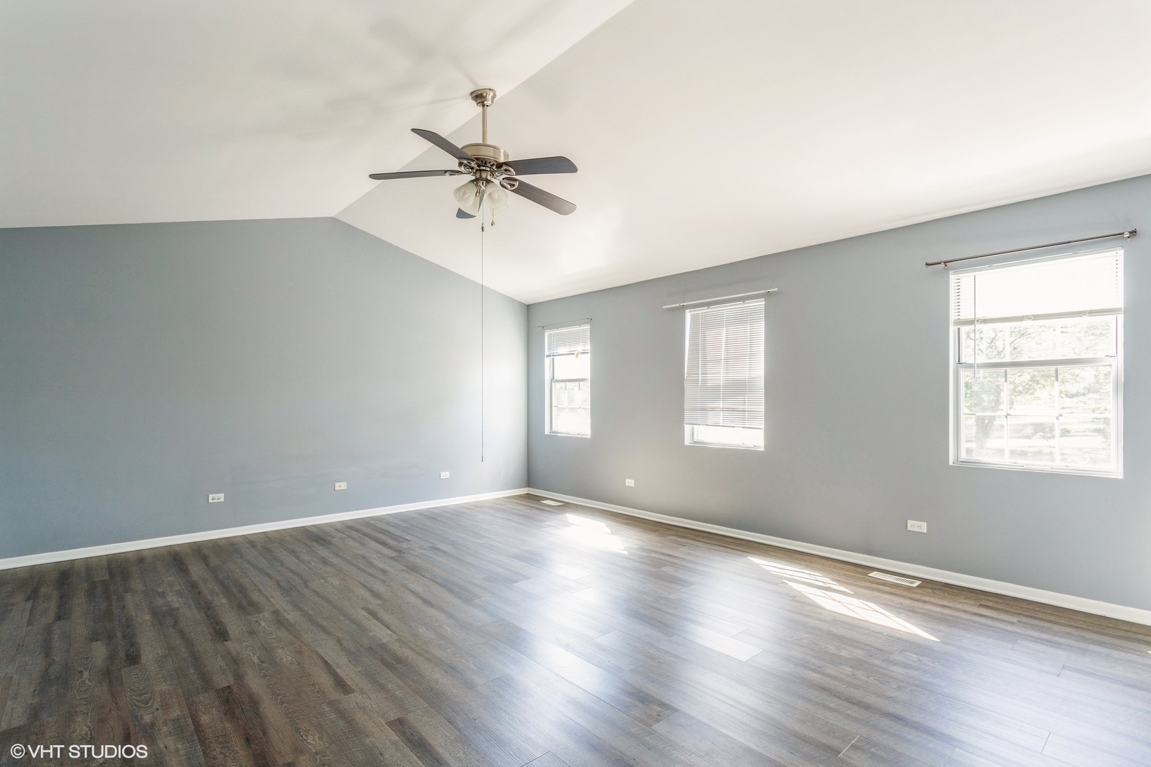 3022 Anton Drive Aurora, IL 60504 - Photo 9 of 15 a view of an empty room with wooden floor and a window