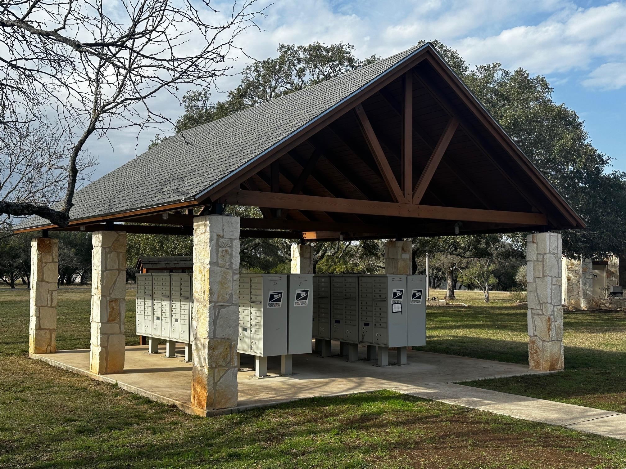 Lot 267 Coventry Road Spicewood, TX 78669 - Photo 17 of 17 a backyard of a house with barbeque oven table and chairs