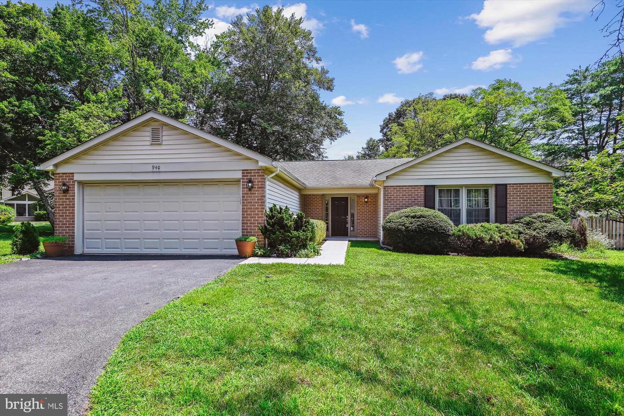 940 Schooner Circle Annapolis, MD 21401 - Photo 1 of 36 a front view of a house with yard and green space