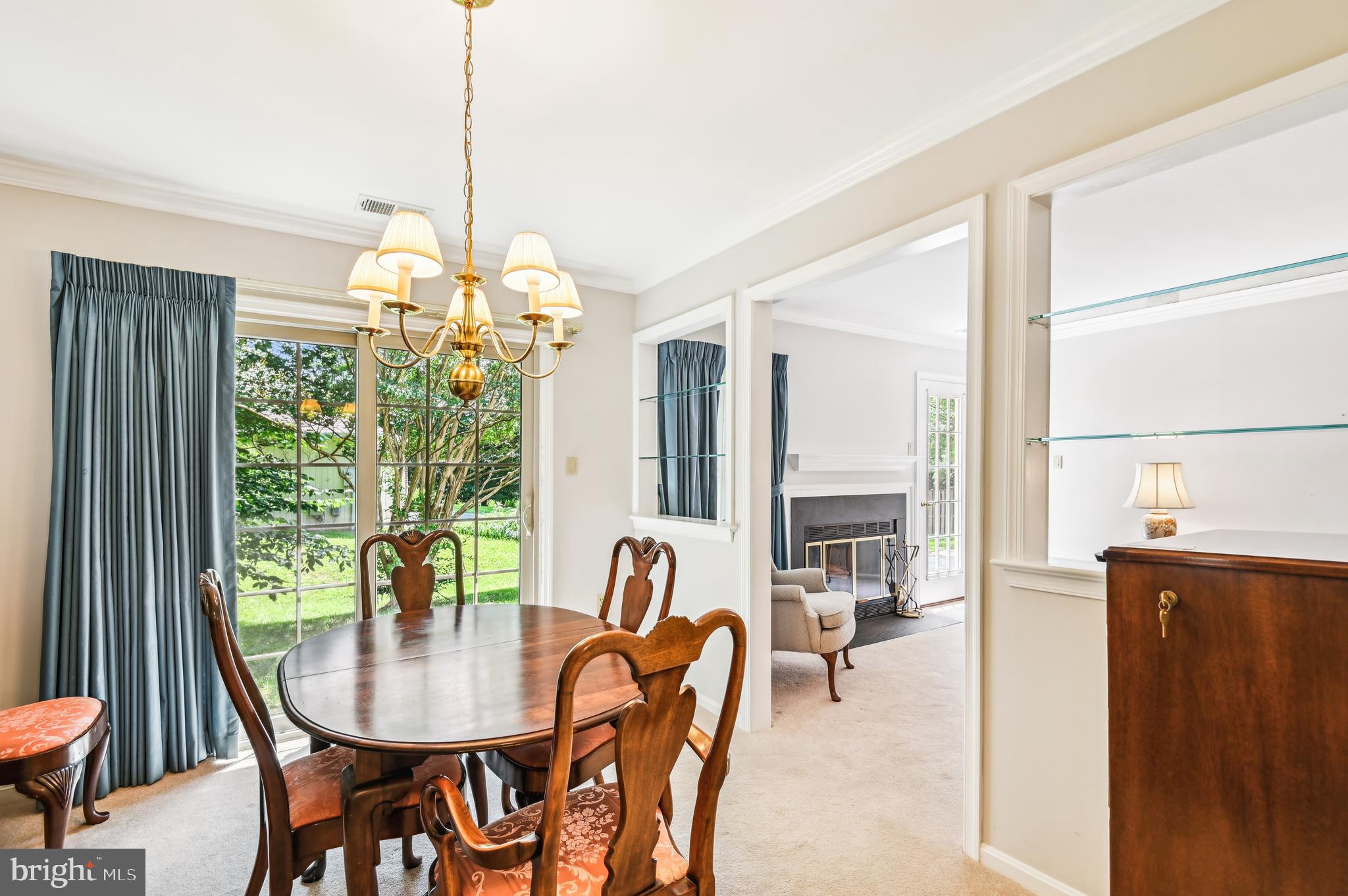 940 Schooner Circle Annapolis, MD 21401 - Photo 15 of 36 a dining room with furniture a chandelier and window