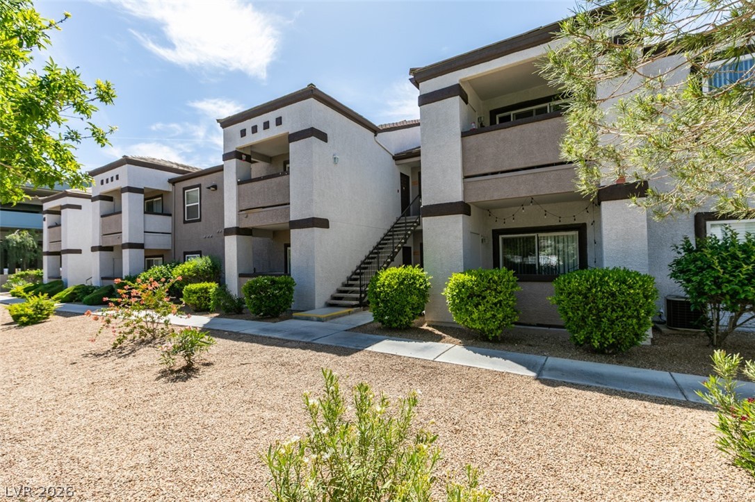 7255 West Sunset Road, Unit 1103 Las Vegas, NV 89113 - Photo 7 of 35 Clean lines and a modern facade define this appealing multi-story building, offering comfortable living.
