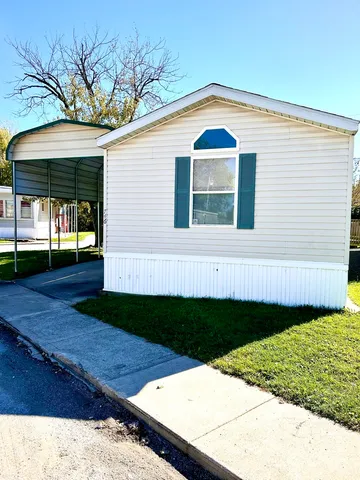 a view of a backyard with plants