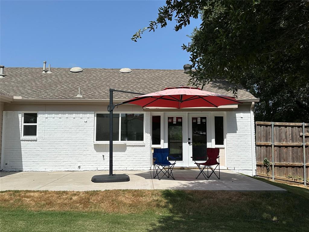 5324 Timber Creek Road Flower Mound, TX 75028 - Photo 13 of 14 Back of property featuring a patio, french doors, and a lawn