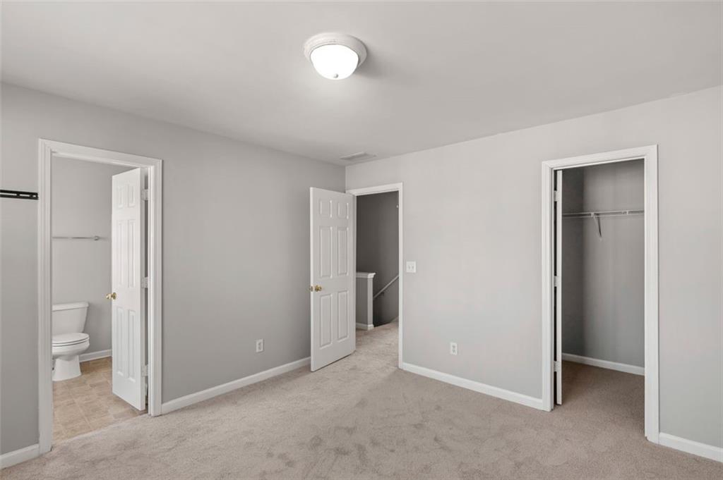 6816 Blackstone Place Mableton, GA 30126 - Photo 22 of 33 a view of an empty room and a room