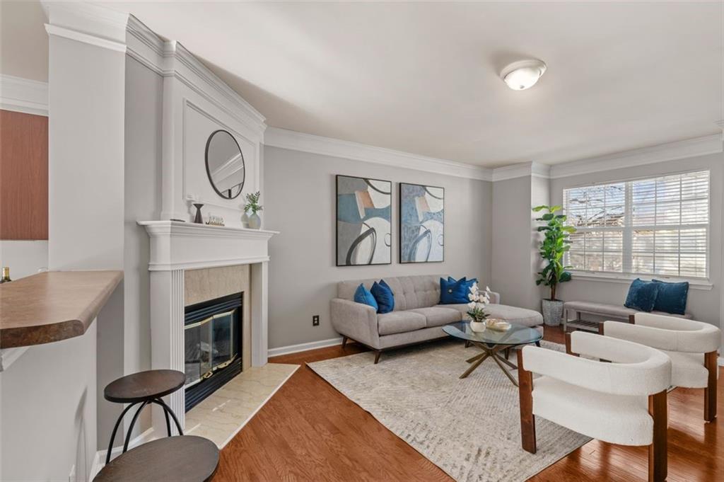 6816 Blackstone Place Mableton, GA 30126 - Photo 10 of 33 a living room with furniture and a fireplace