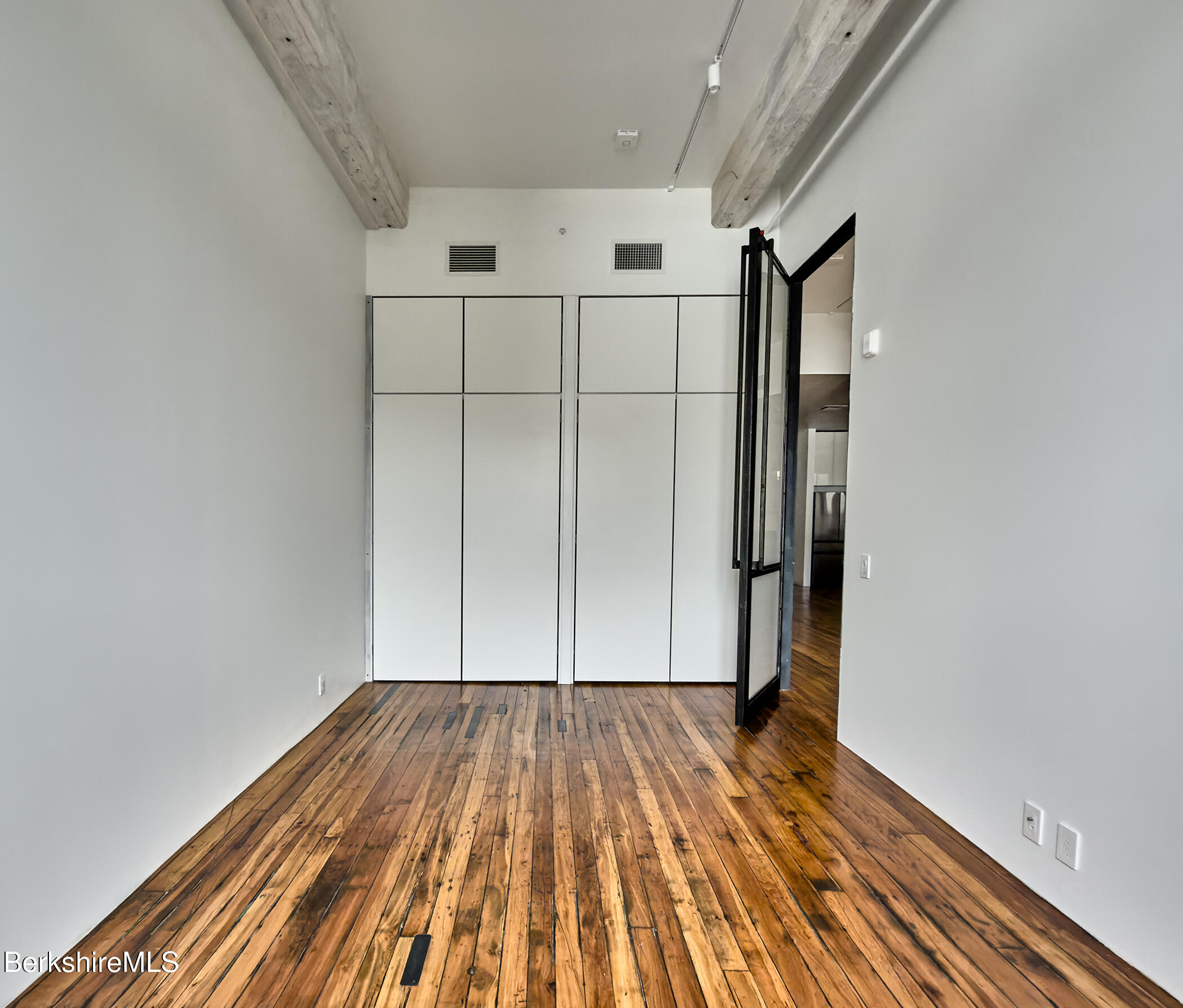 520 State Road, Unit 203 North Adams, MA 01247 - Photo 11 of 17 a view of empty room with wooden floor