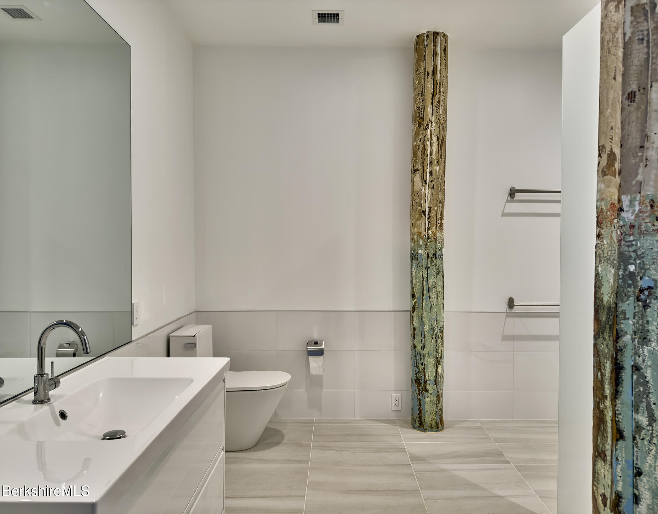 520 State Road, Unit 203 North Adams, MA 01247 - Photo 14 of 17 a bathroom with a sink and a mirror