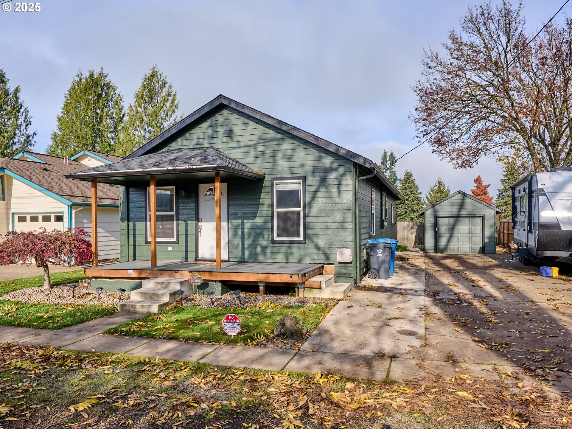 1006 Well Street Silverton, OR 97381 - Photo 25 of 35 a front view of a house with garden