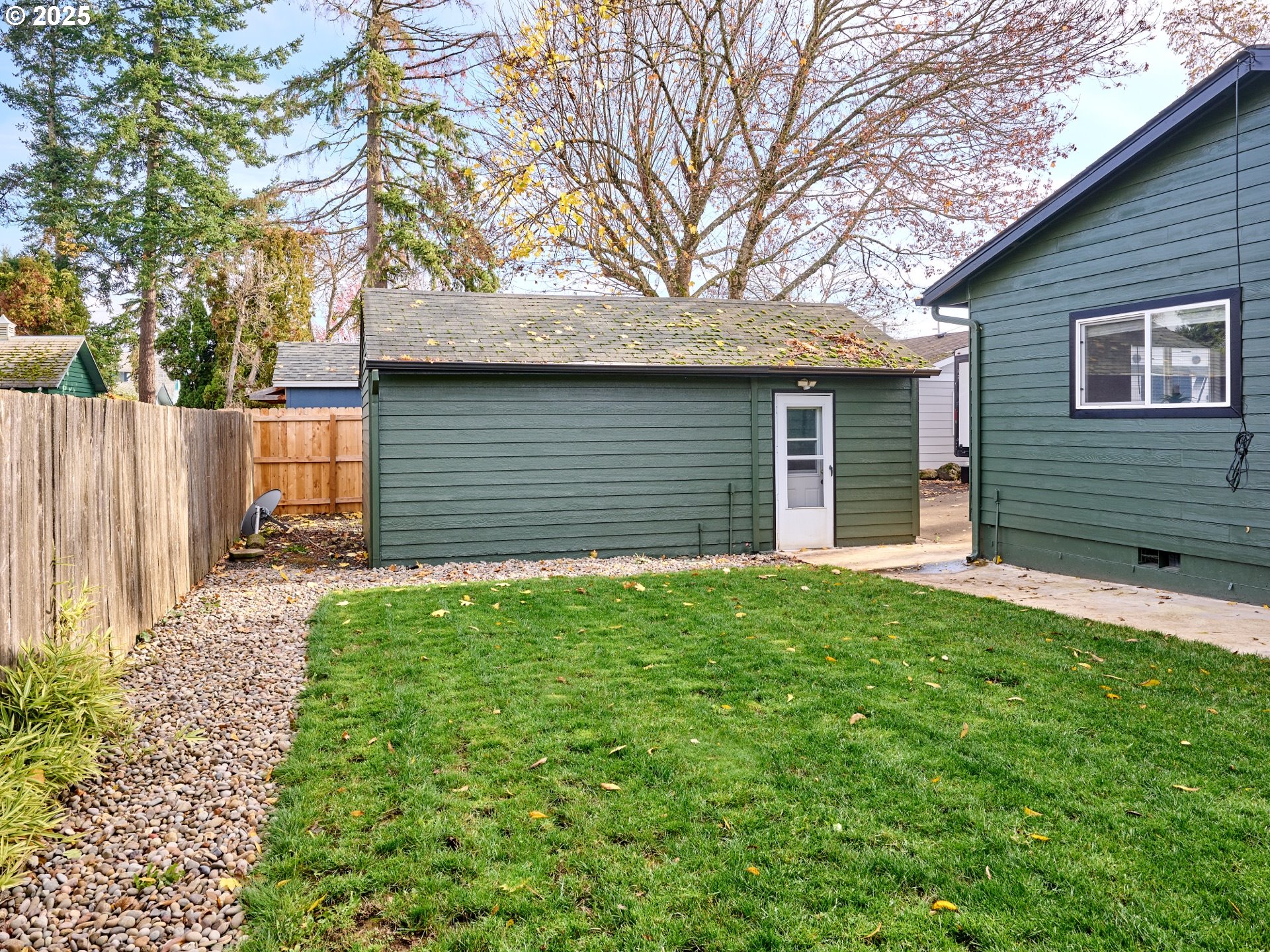1006 Well Street Silverton, OR 97381 - Photo 28 of 35 a front view of a house with a garden