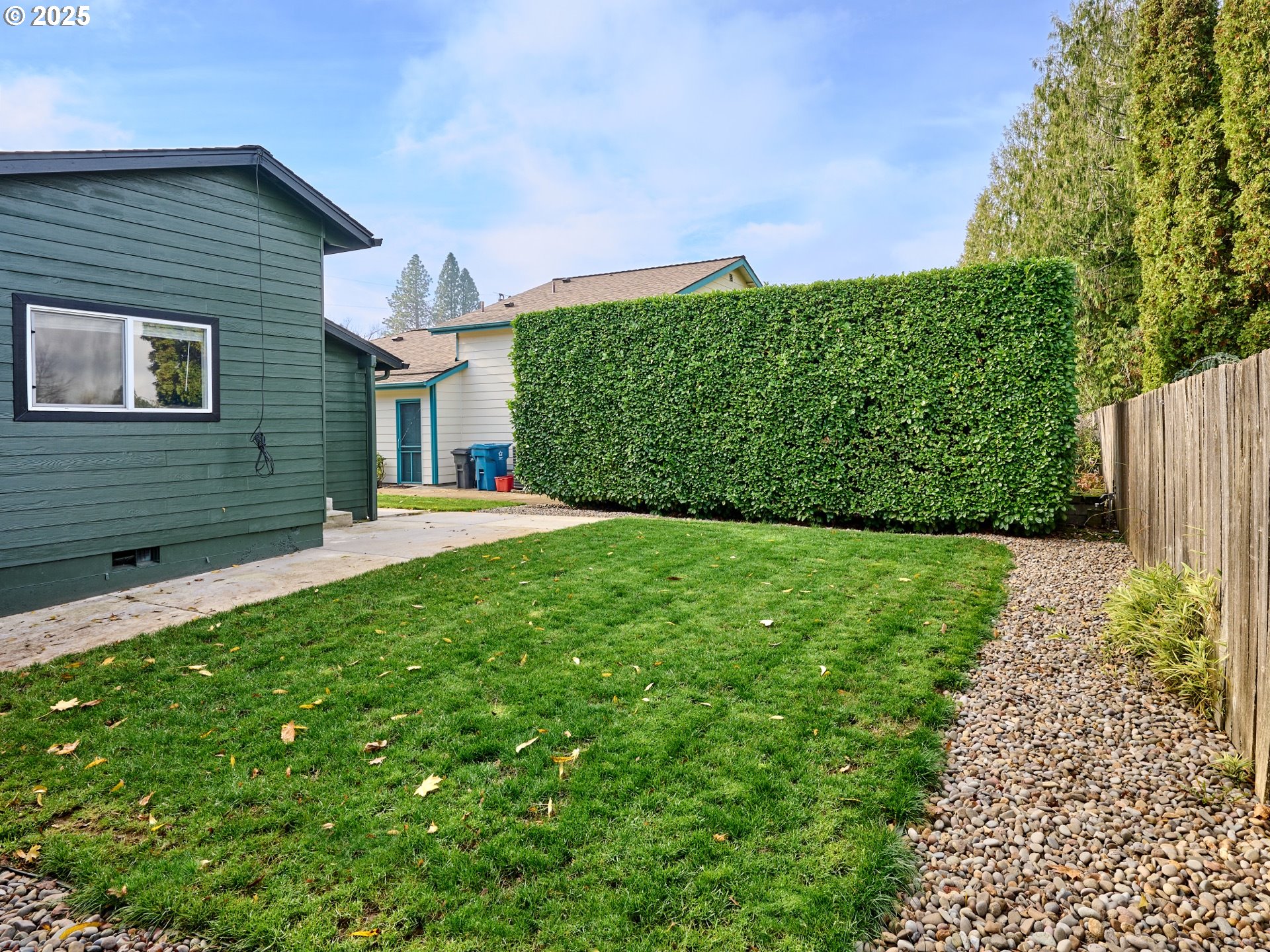 1006 Well Street Silverton, OR 97381 - Photo 30 of 35 a view of a house with a yard