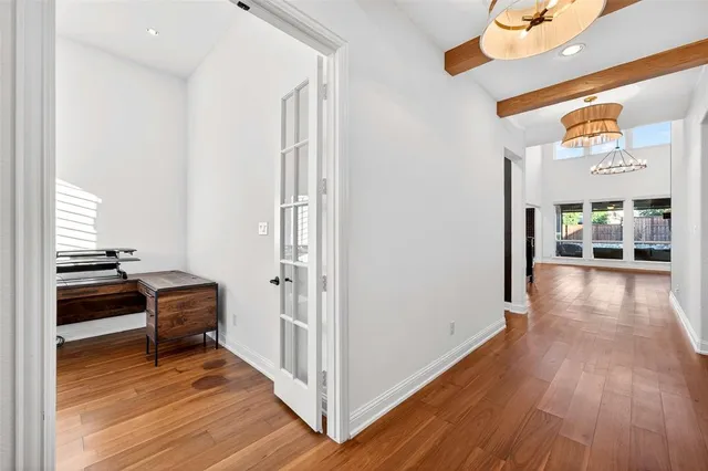 a view of a livingroom with furniture and a window