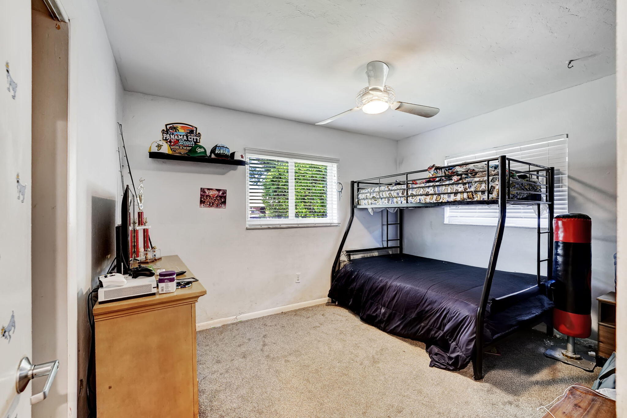 1260 Southwest 17th Street Boca Raton, FL 33486 - Photo 15 of 23 a bedroom with a bed and wooden floor