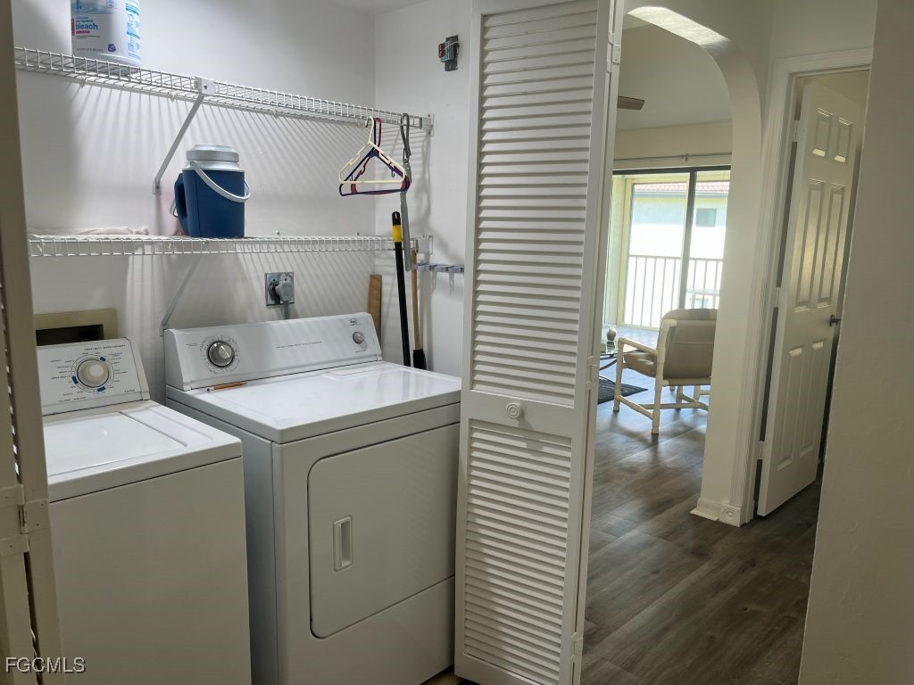 11500 Caravel Circle, Unit 4028 Fort Myers, FL 33908 - Photo 34 of 34 a utility room with dryer and washer