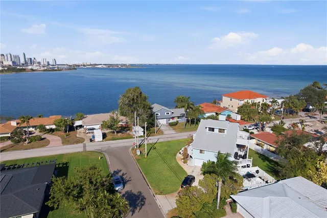 an aerial view of a houses with outdoor space