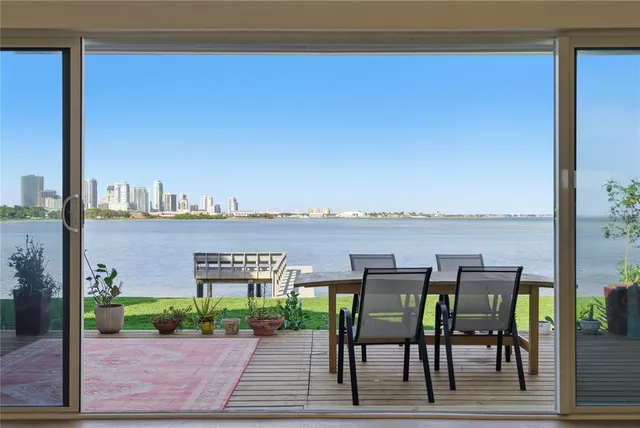 a view of a terrace with seating area and furniture