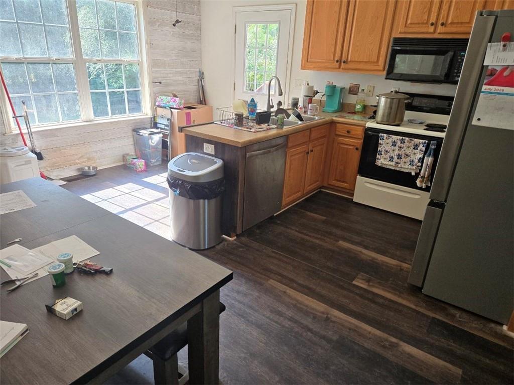 805 Gose Road Forsyth, GA 31029 - Photo 6 of 29 a kitchen with a sink appliances and cabinets