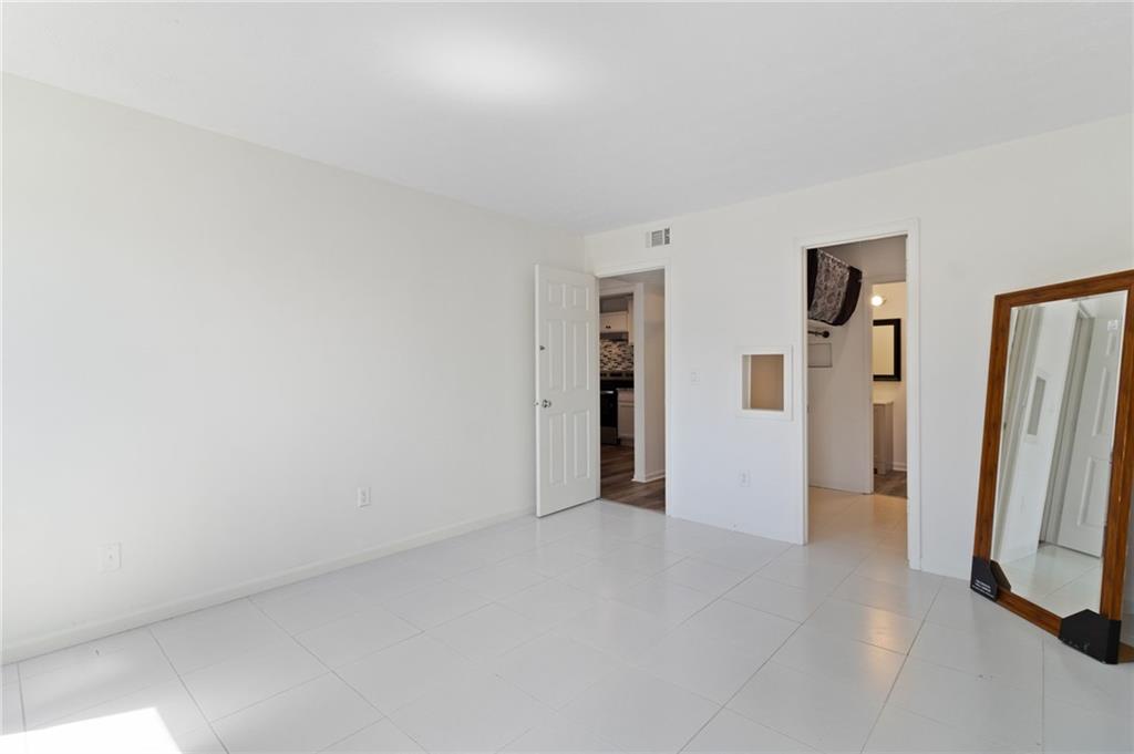 1382 Branch Drive Tucker, GA 30084 - Photo 13 of 29 an empty room with closet and a window