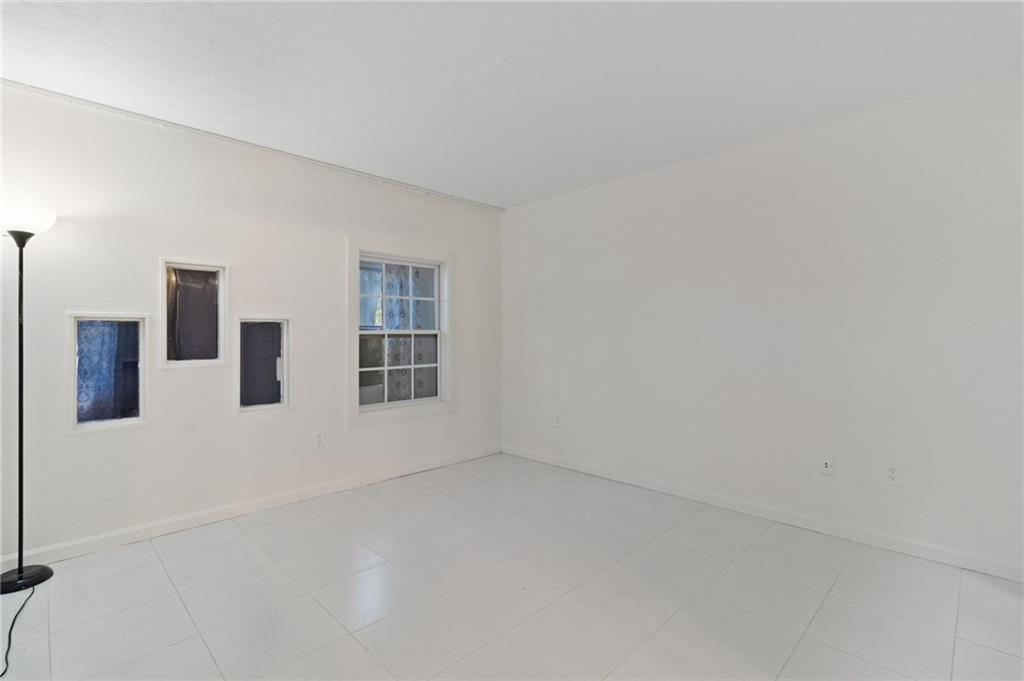 1382 Branch Drive Tucker, GA 30084 - Photo 18 of 29 an empty room with windows