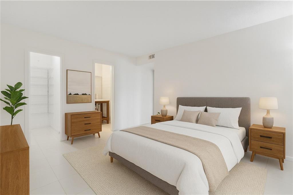 1382 Branch Drive Tucker, GA 30084 - Photo 20 of 29 a bedroom with a bed and a couch