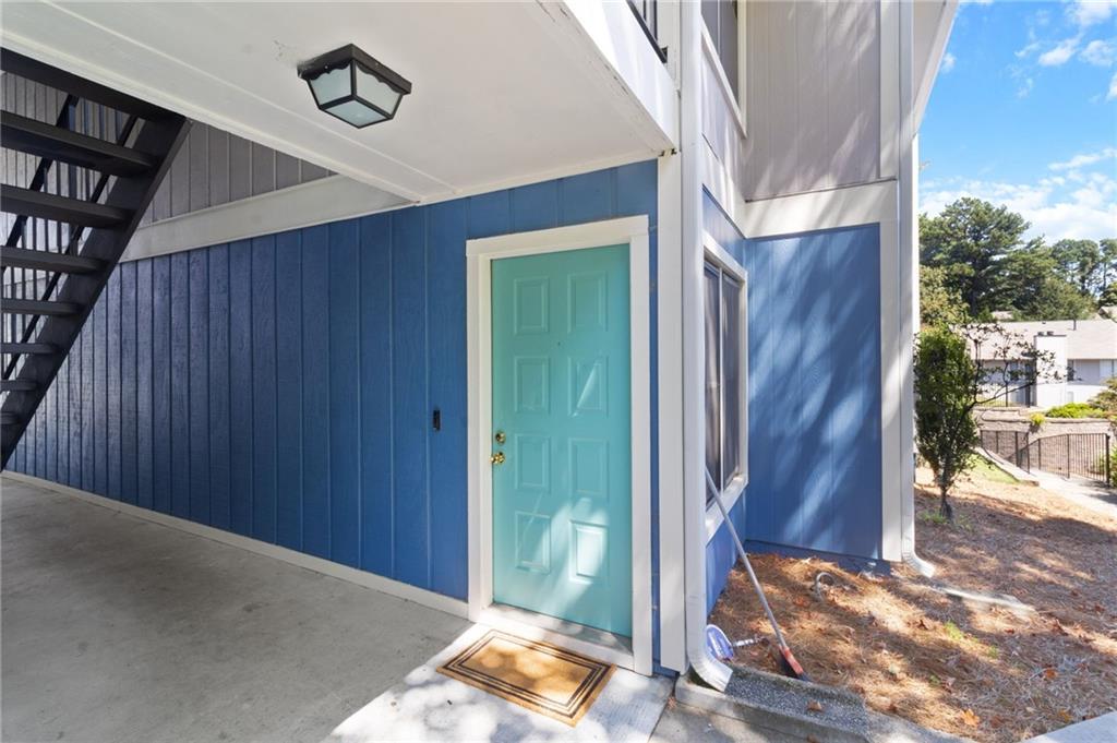 1382 Branch Drive Tucker, GA 30084 - Photo 27 of 29 a view of a hallway with wooden floor and stairs