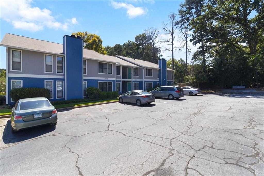 1382 Branch Drive Tucker, GA 30084 - Photo 28 of 29 a car parked in front of a brick house