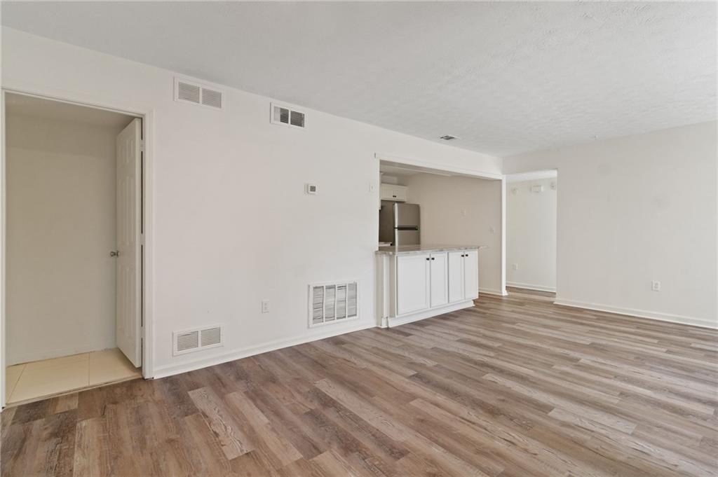 1382 Branch Drive Tucker, GA 30084 - Photo 3 of 29 a view of empty room with wooden floor