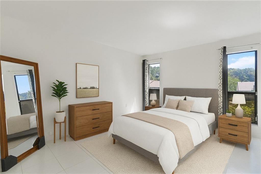 1382 Branch Drive Tucker, GA 30084 - Photo 10 of 29 a bedroom with a bed and a dresser