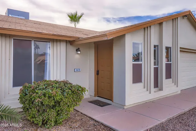a view of a house with a glass door
