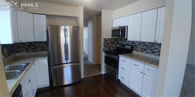 1521 Wooten Road Colorado Springs, CO 80915 - Photo 3 of 7 Gallery Image 3