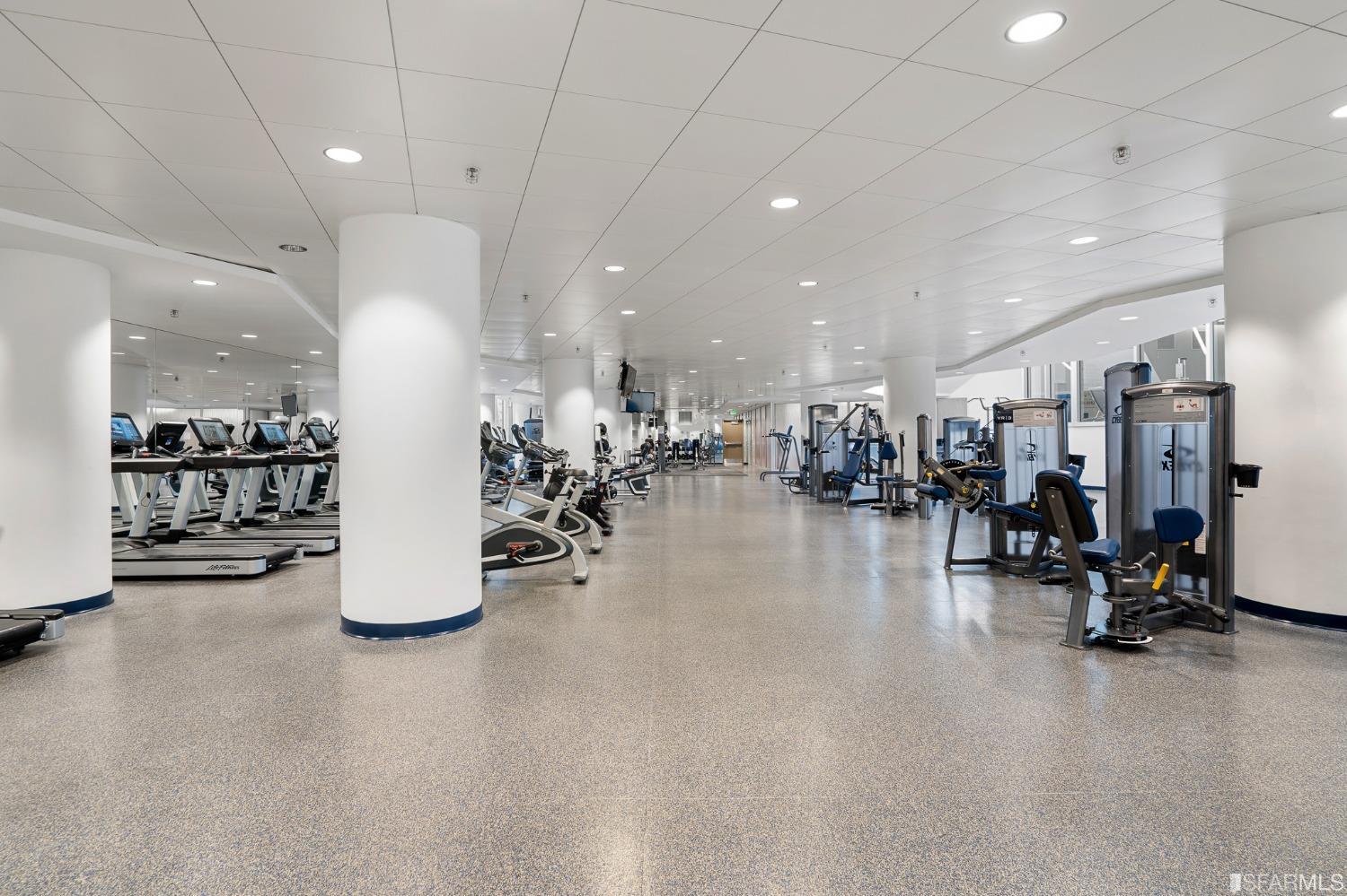 301 Main Street, Unit 17E San Francisco, CA 94105 - Photo 15 of 22 a view of a room with gym equipment