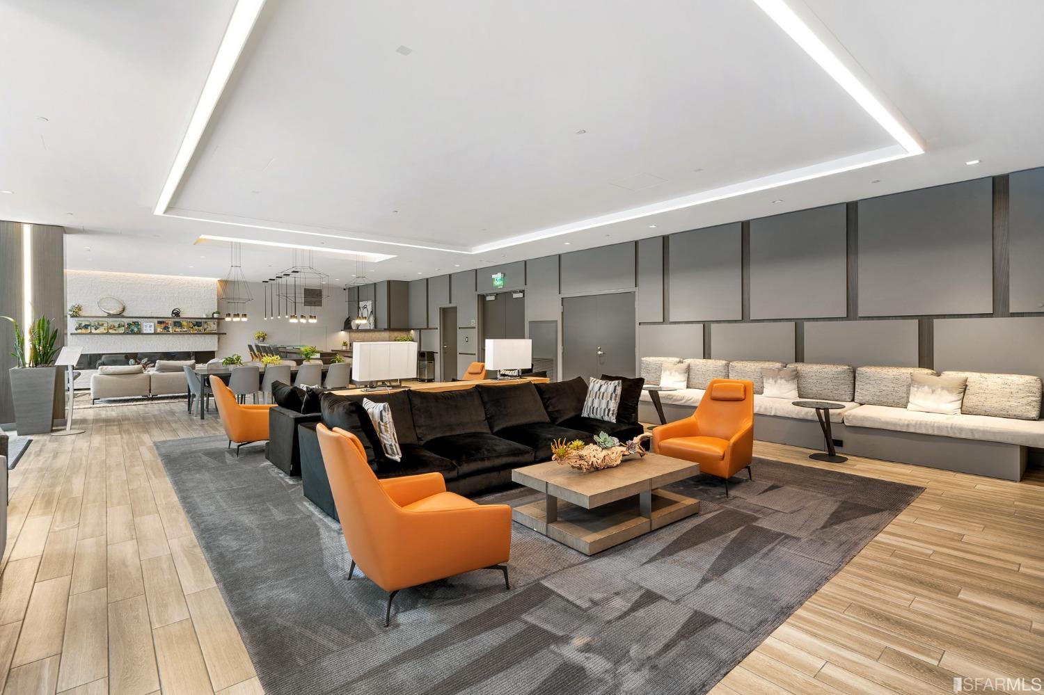 301 Main Street, Unit 17E San Francisco, CA 94105 - Photo 17 of 22 a living room with lots of furniture and view of kitchen