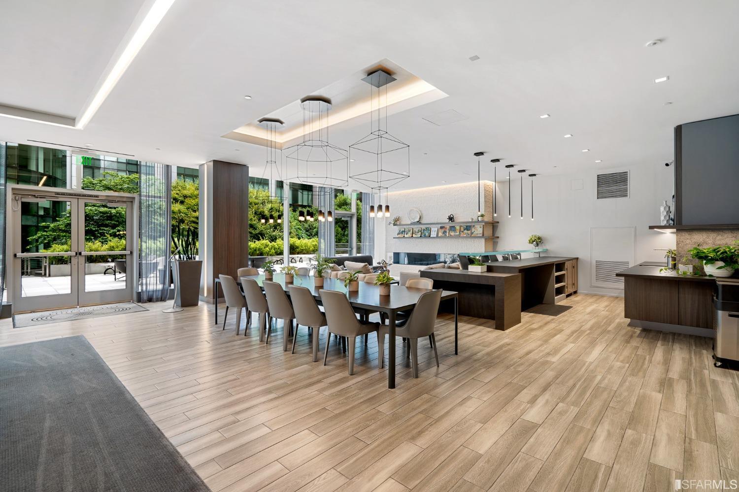 301 Main Street, Unit 17E San Francisco, CA 94105 - Photo 18 of 22 a very nice looking living room with kitchen and a dining table
