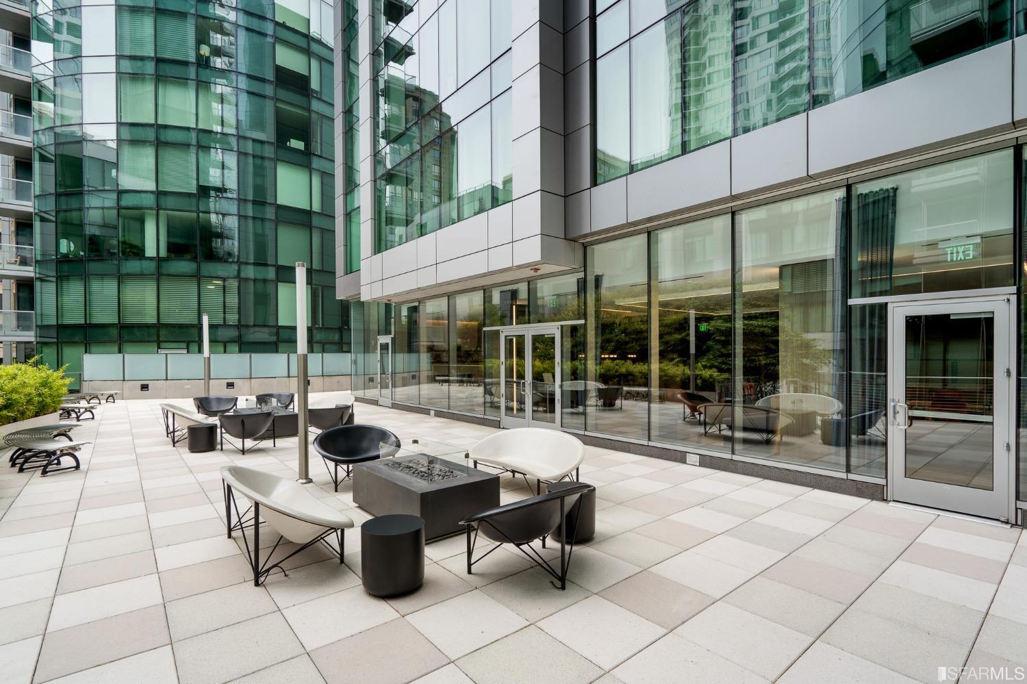 301 Main Street, Unit 17E San Francisco, CA 94105 - Photo 21 of 22 a view of pool with outdoor seating
