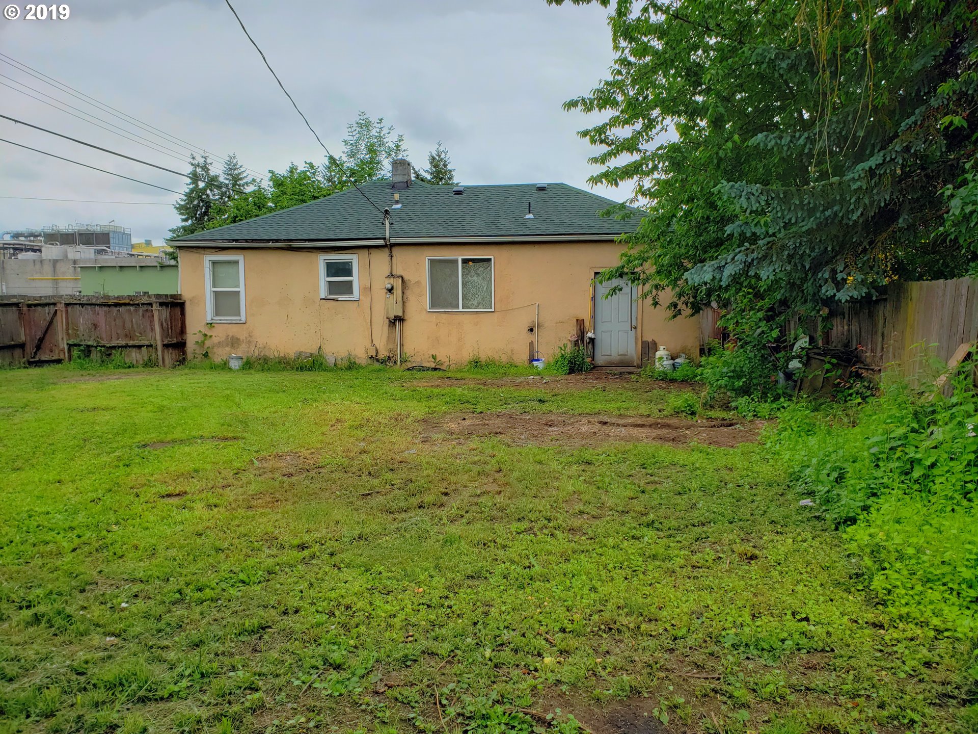 2780 E Street Springfield, OR 97477 - Photo 14 of 15 a view of a house with a backyard