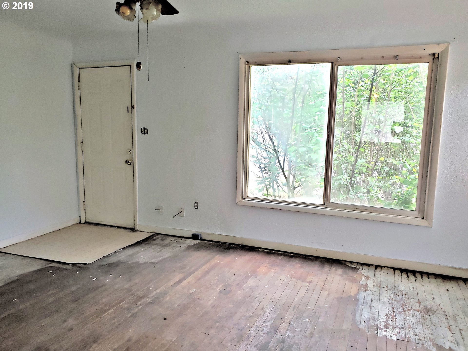 2780 E Street Springfield, OR 97477 - Photo 4 of 15 a view of an empty room with a window