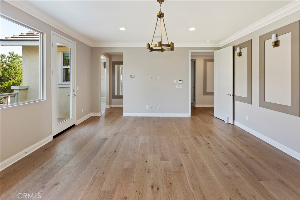 11548 Grimaldi Road Rancho Cucamonga, CA 91701 - Photo 30 of 39 wooden floor in an empty room with a window