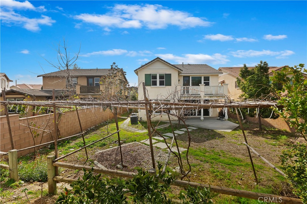 11548 Grimaldi Road Rancho Cucamonga, CA 91701 - Photo 37 of 39 a view of a patio with table and chairs