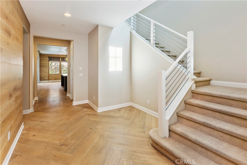 11548 Grimaldi Road Rancho Cucamonga, CA 91701 - Photo 7 of 39 a view of a hallway view with staircase