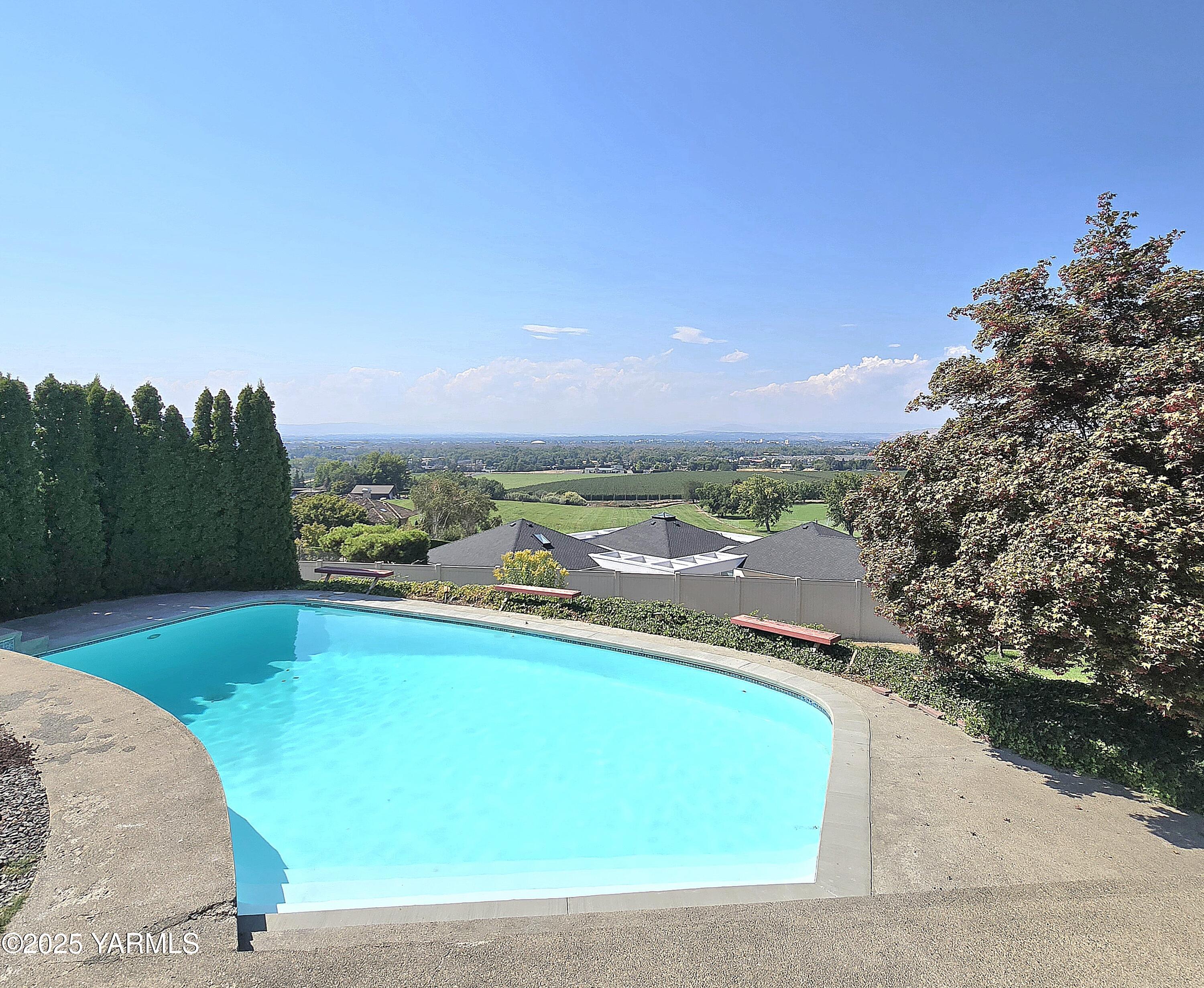 720 Country Club Drive Yakima, WA 98901 - Photo 41 of 48 a view of a swimming pool and lake view