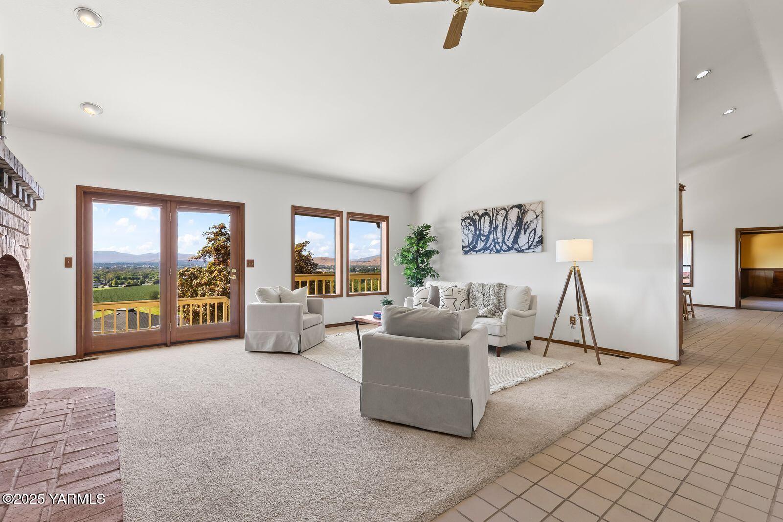 720 Country Club Drive Yakima, WA 98901 - Photo 7 of 48 a living room with furniture and a floor to ceiling window