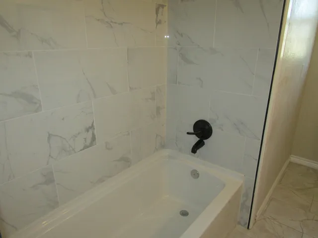 a bathroom with a tub