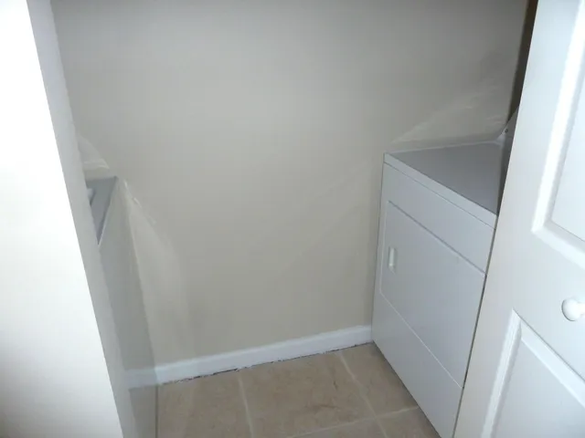 a view of a swimming pool with palm trees