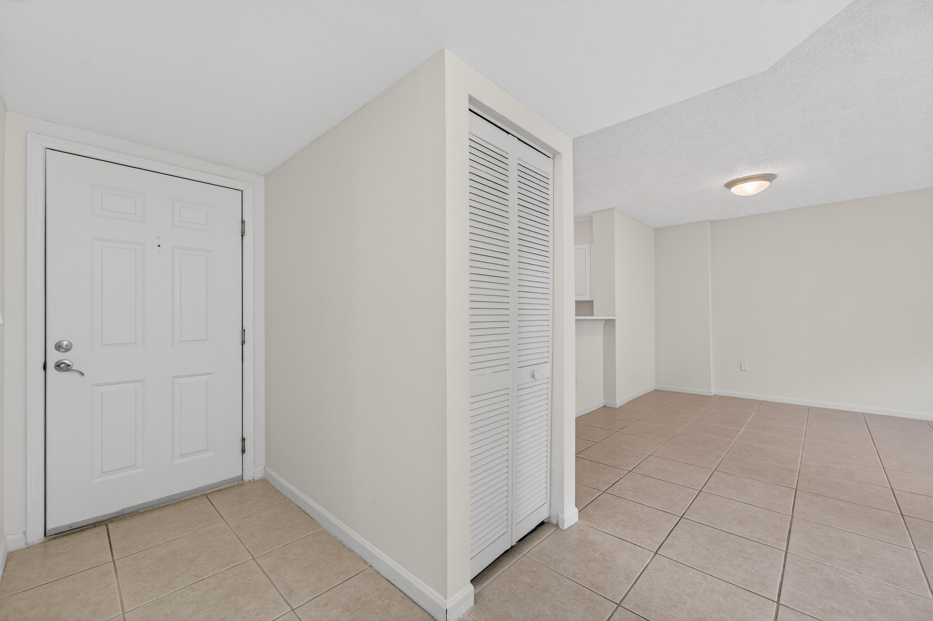 651 Okeechobee Boulevard, Unit 302 West Palm Beach, FL 33401 - Photo 17 of 29 a view of an empty room