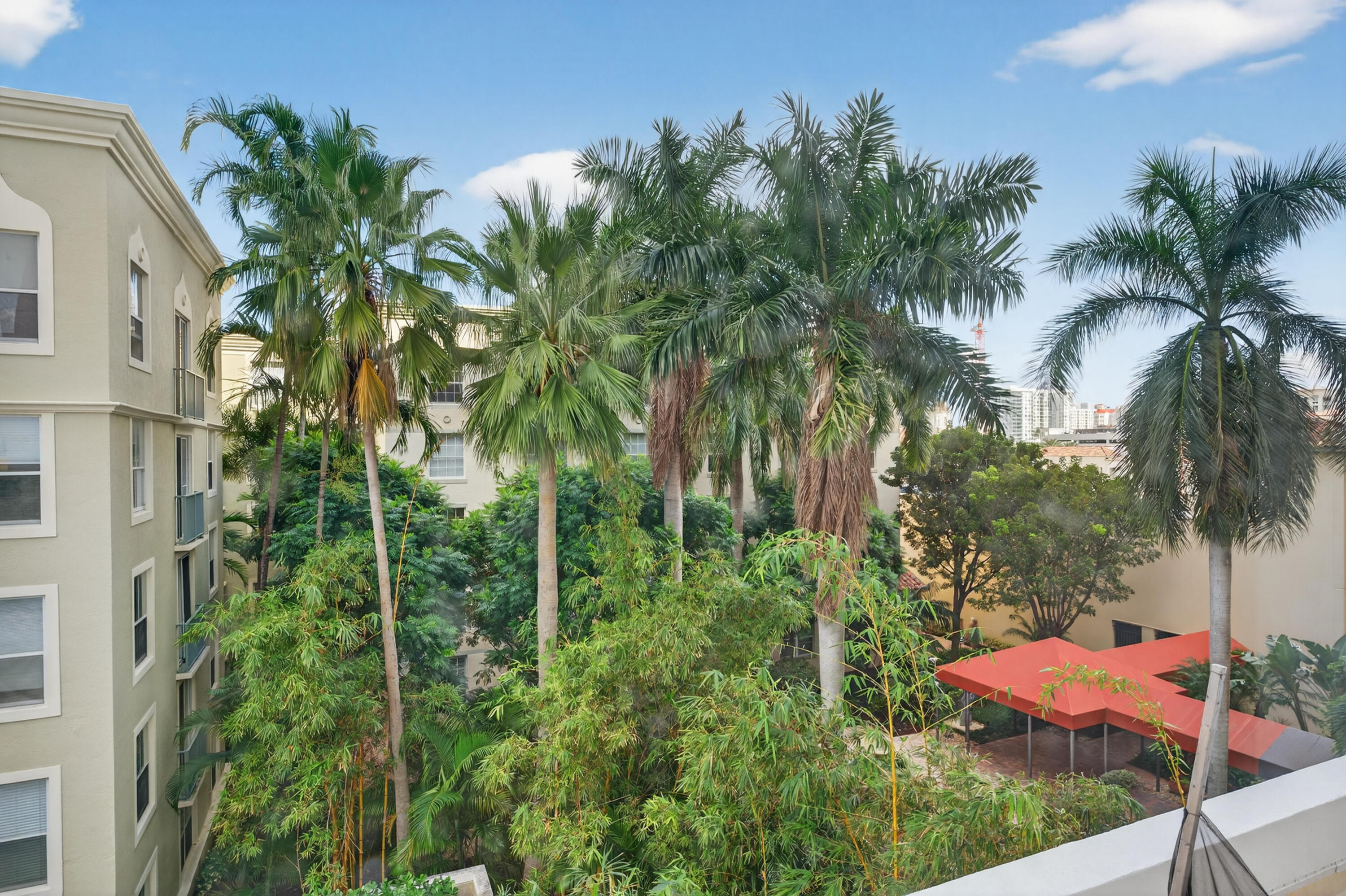651 Okeechobee Boulevard, Unit 302 West Palm Beach, FL 33401 - Photo 20 of 29 a view of a backyard