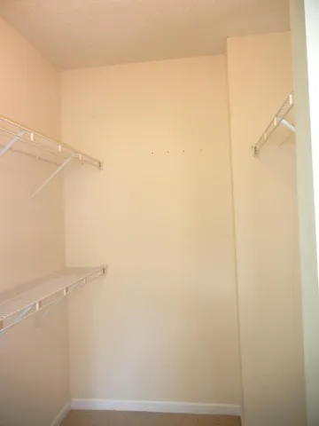 a view of small space with racks on the wall