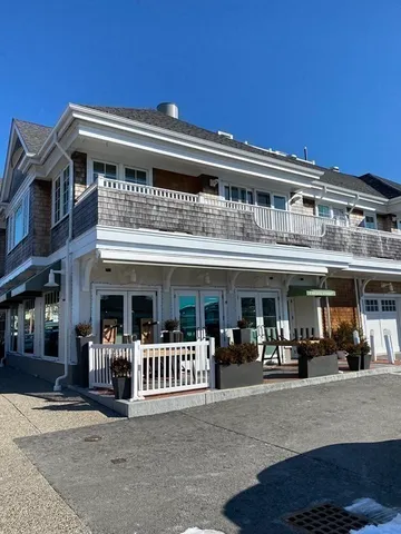 a view of a building with a lot of people