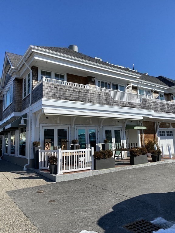 a view of a building with a lot of people